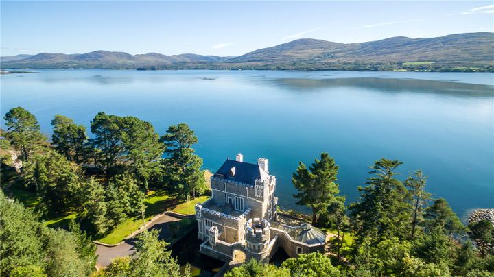 Where Wild Atlantic Waves Kiss a Modern Castle’s Stone
