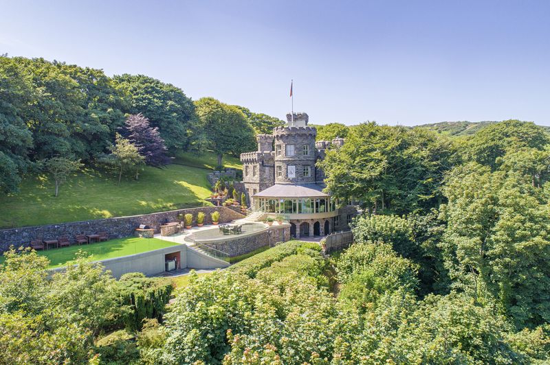 The Gothic Crown of Douglas Bay: A Castle of Whispers & Waves