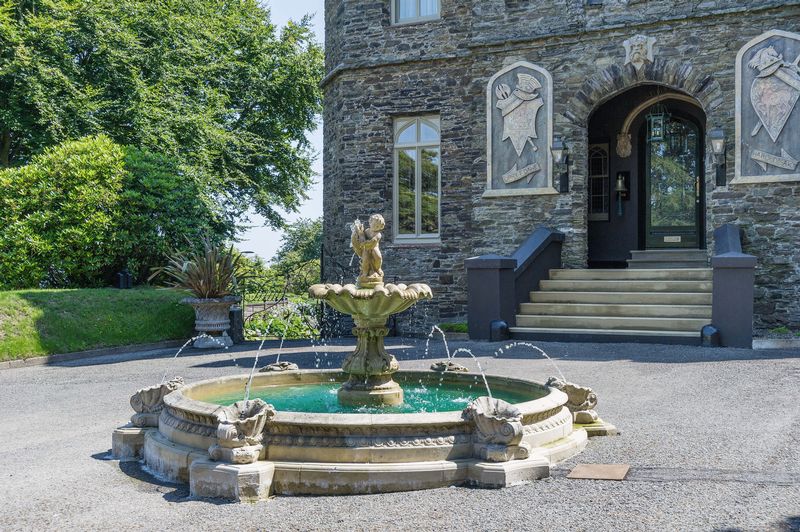 The Gothic Crown of Douglas Bay: A Castle of Whispers & Waves