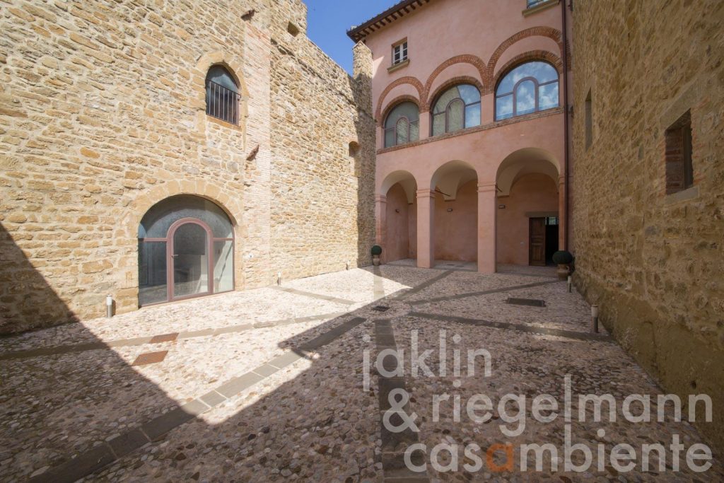 Whispers of the 13th Century: A Castle Apartment by Lake Trasimeno’s Shores
