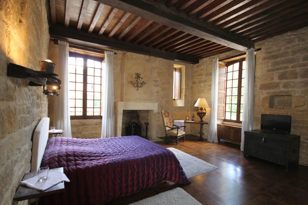 Saint-Geniès: A Love Story Woven in Golden Stone, Where Two Houses Became One Castle