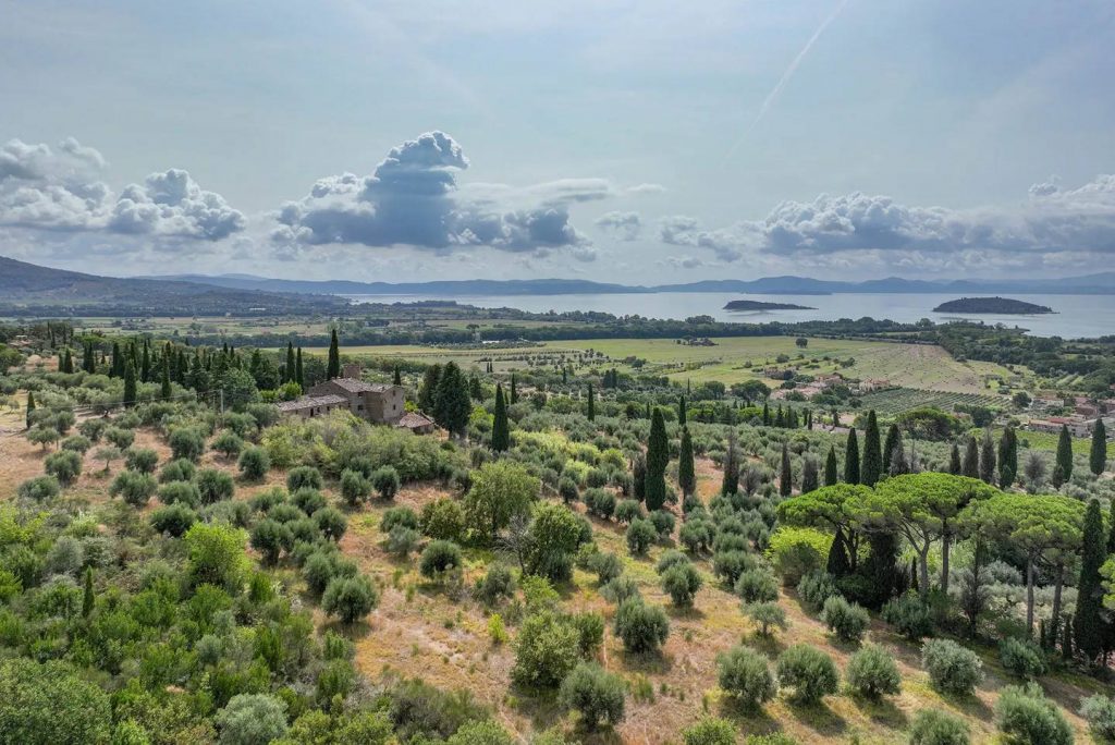 Whispers of Trasimeno: A Medieval Sentinel’s Timeless Embrace